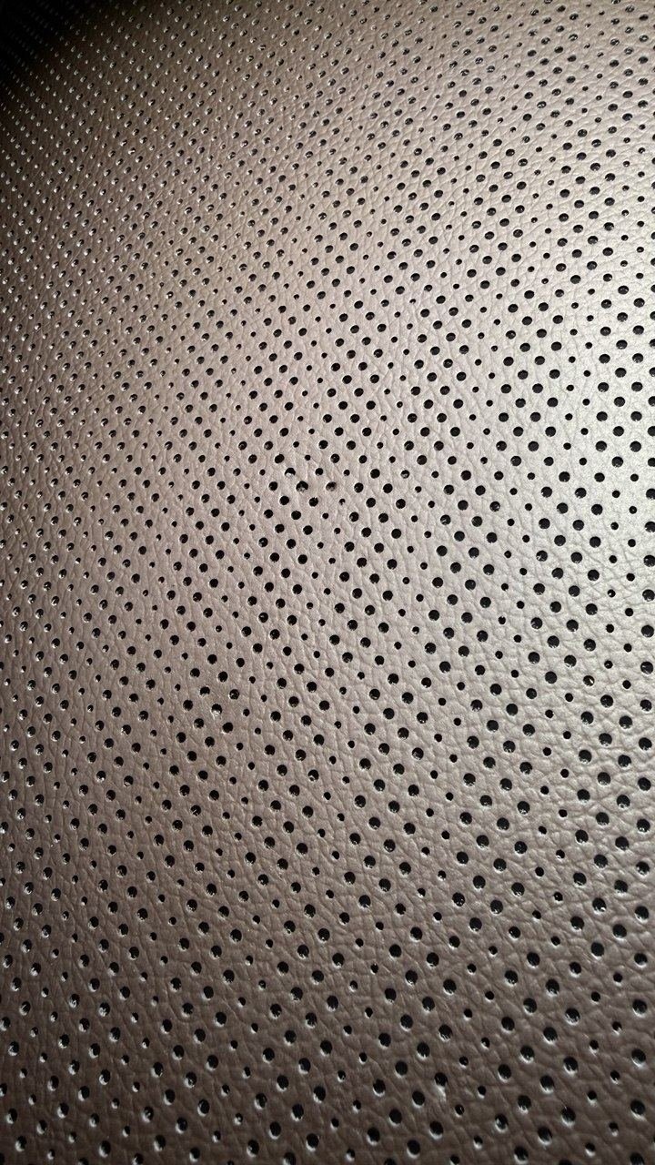 The same panel with the perforation rebuilt by hand