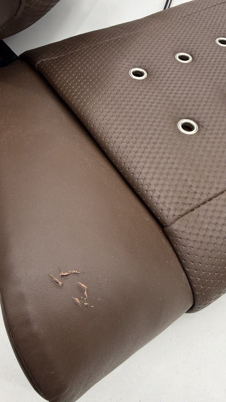 Brown seat split along the seam