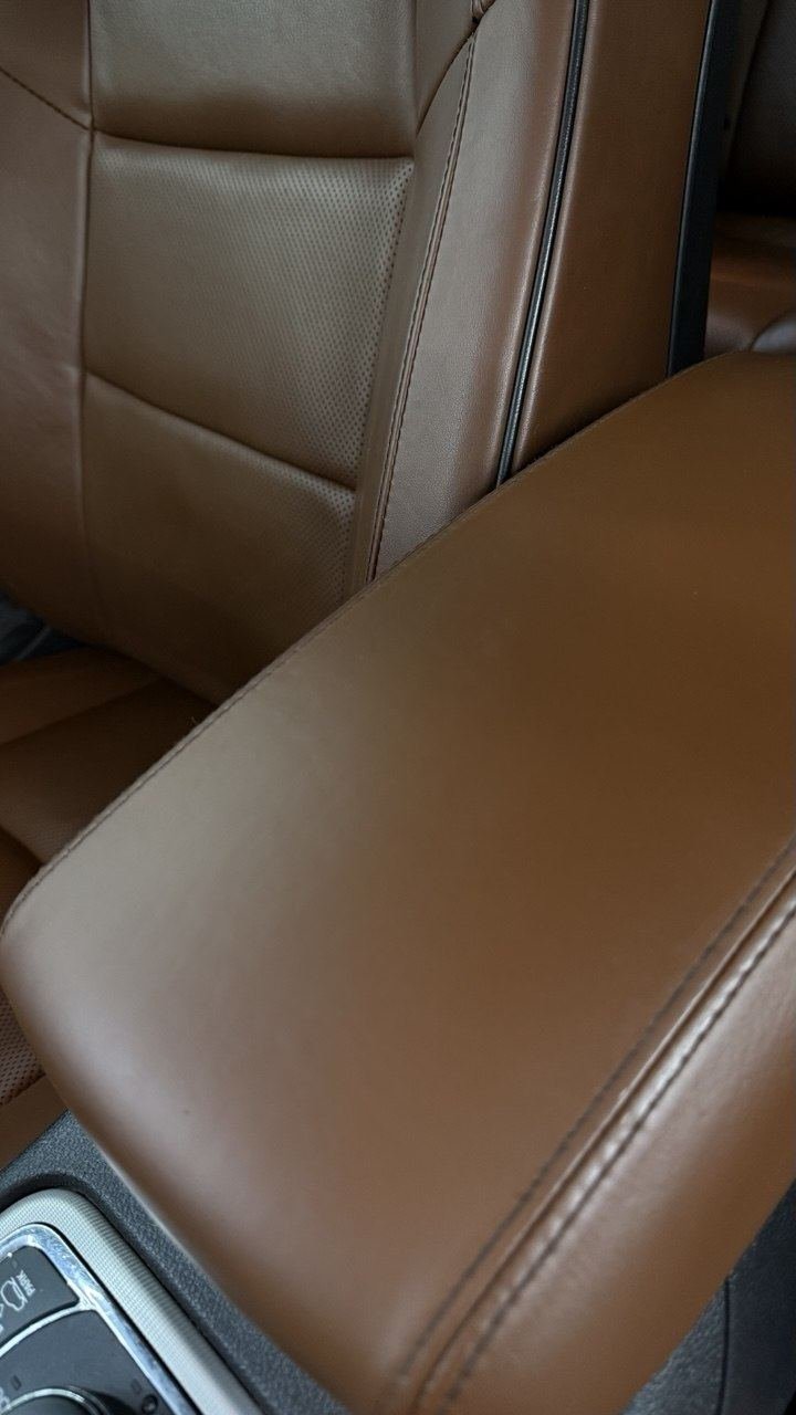 Brown console armrest, refinished