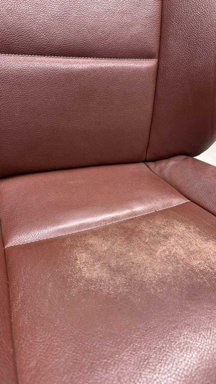 Burgundy seat, faded and rubbed