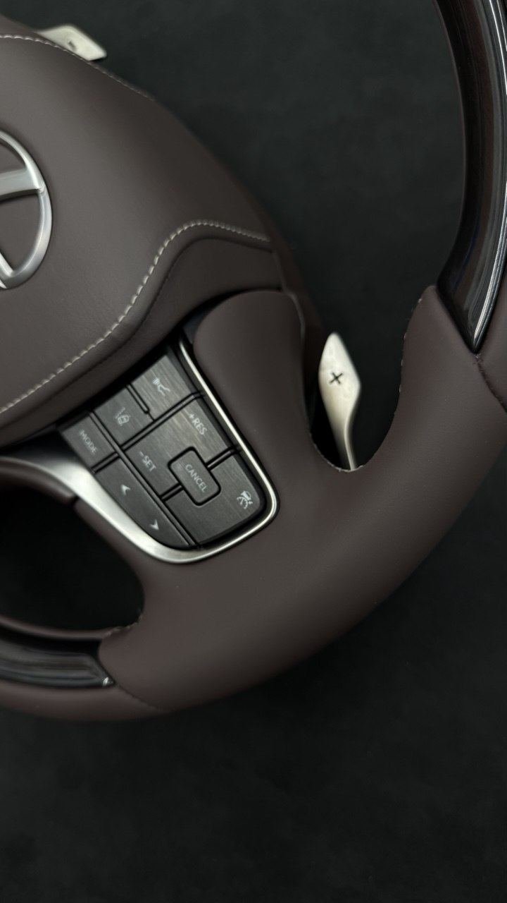 Steering wheel with controls, restored