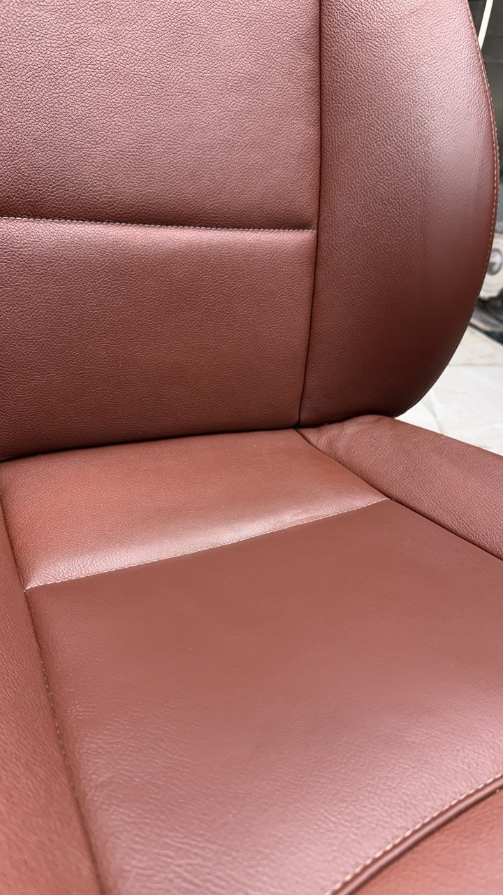 The same burgundy seat, colour restored