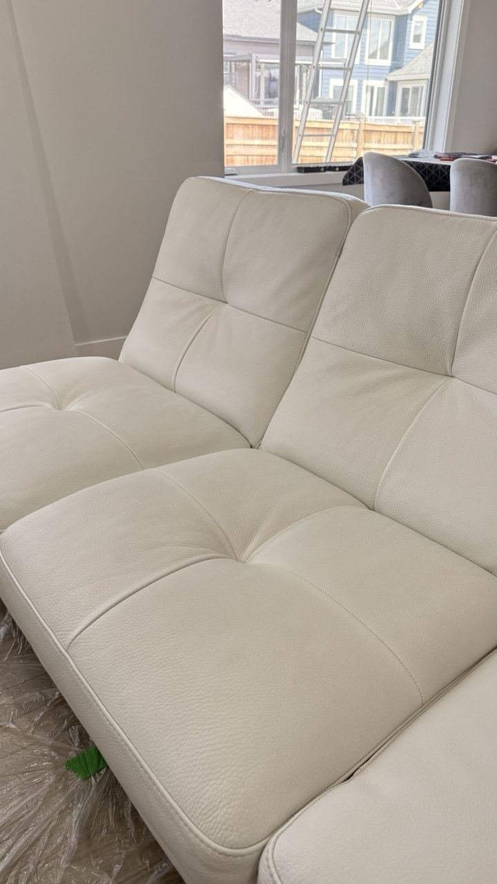 The same white sofa, cleaned and recoloured