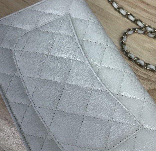 The same quilted flap bag, ink restored and recoloured, cropped to match the before photo