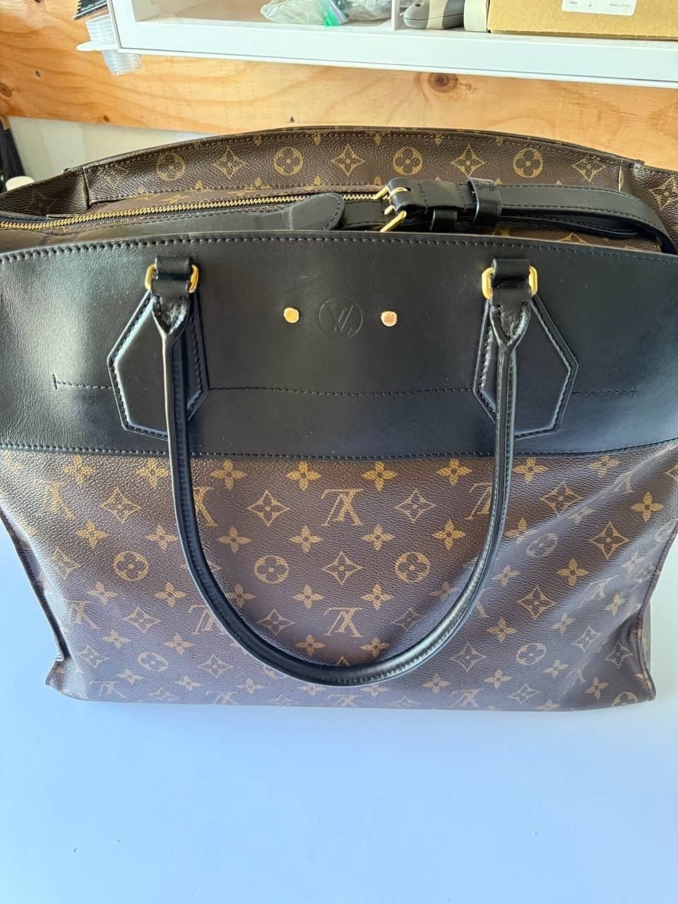 Louis Vuitton tote before work, trim worn