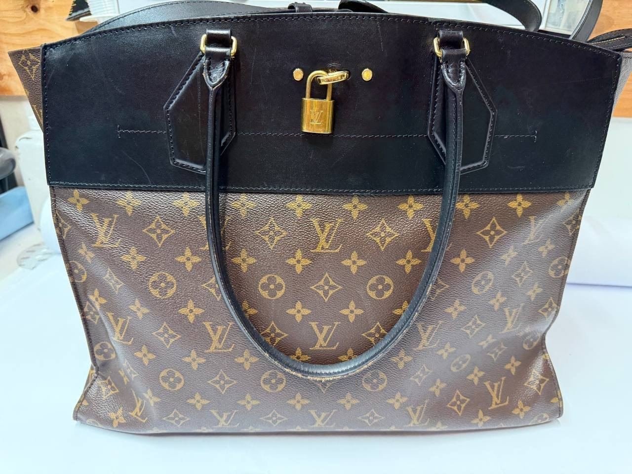 The same tote with the leather trim restored