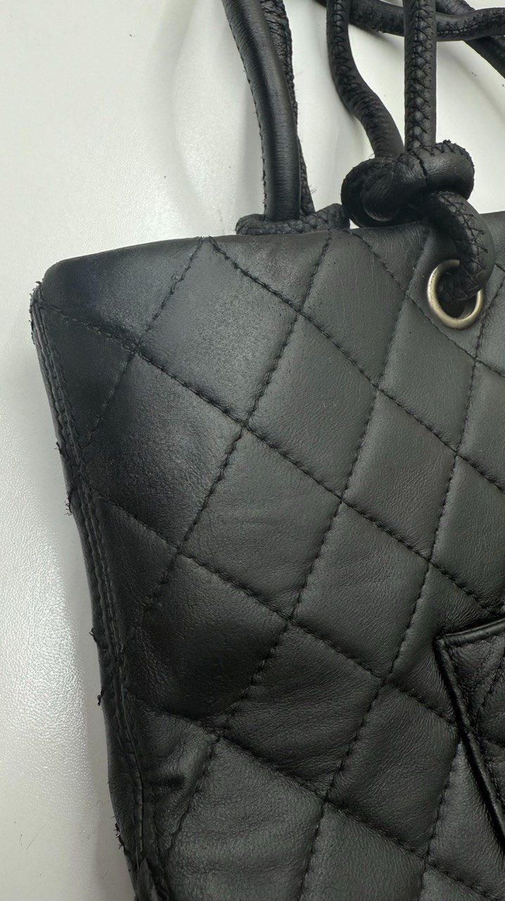 The same tote, corner rebuilt